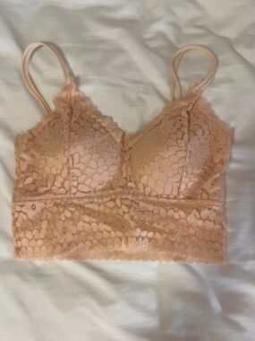peach Y2K lacy bralette.